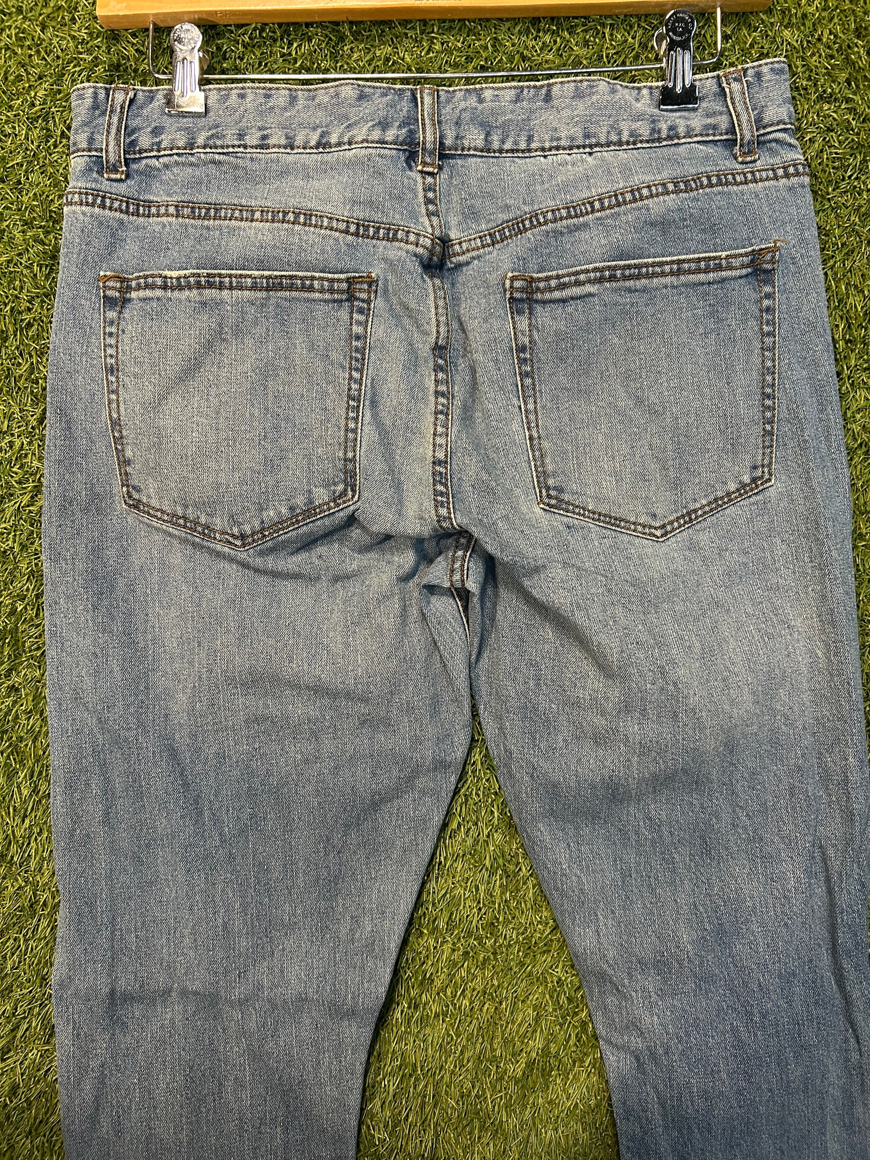 Forever 21 Ripped Knee Fitted Jeans