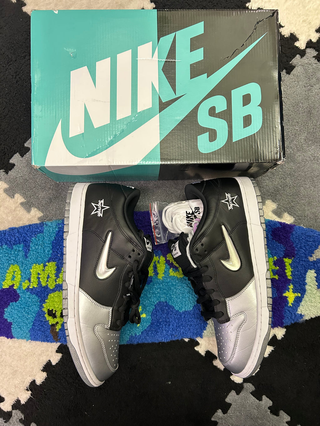 Nike SB Dunk Low X Supreme Jewel Swoosh Silver